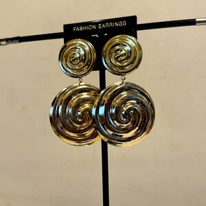 Gold tone circular dangle earrings with swirl designs pierced earrings
